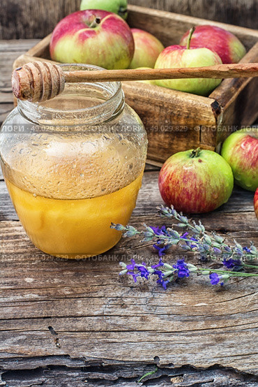 Honey Spas. Still life from the harvest of ripe apples and honey to the Church celebration of the apple feast day.Photo tinted. Стоковое фото, агентство Ingram Publishing / Фотобанк Лори