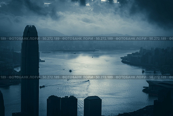 Hong Kong - April 25, 2020: Panorama of Victoria Harbor of Hong Kong city, cityscape with skyscraper. Редакционное фото, агентство Ingram Publishing / Фотобанк Лори