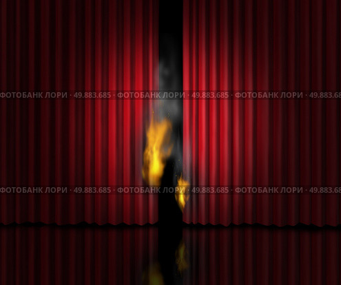 Hot show entertainment concept as a theatre stage with red velvet curtains or drapes burning with flames and smoke as a metaphor for a sizzling cinematic performance or the heat of gossip scandal or steamy rumors. Стоковое фото, агентство Ingram Publishing / Фотобанк Лори