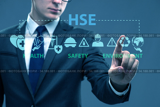 HSE concept with businessman pressing virtual button. Стоковое фото, фотограф Elnur / Фотобанк Лори