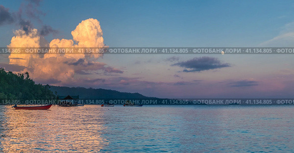Huge White Clouds above Diving Station on Sunset, Homestay Gam Island, West Papuan, Raja Ampat, Indonesia (2016 год). Стоковое фото, фотограф Igor Tichonow / Фотобанк Лори