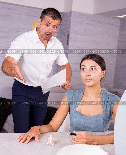 Husband scolding wife painting nails. Стоковое фото, фотограф Яков Филимонов / Фотобанк Лори