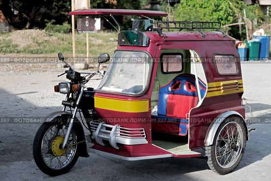 in asia philipphines the typical tuk tuk motorbike for tourist. Стоковое фото, агентство Ingram Publishing / Фотобанк Лори