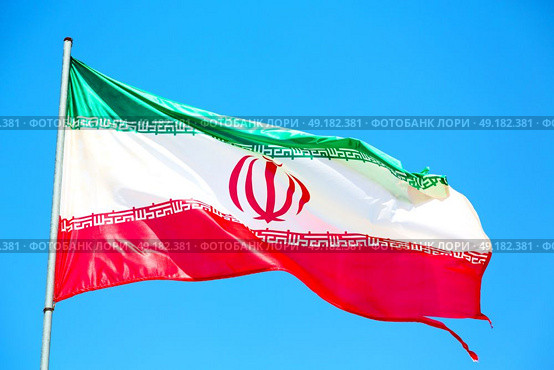 in iran iranian waving flag  the blue sky and wind. Стоковое фото, агентство Ingram Publishing / Фотобанк Лори