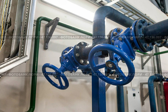 Industrial Valves and Piping in a Facility, Showcasing Modern Engineering and Design. Стоковое фото, фотограф Aleksandr Golubev / Фотобанк Лори