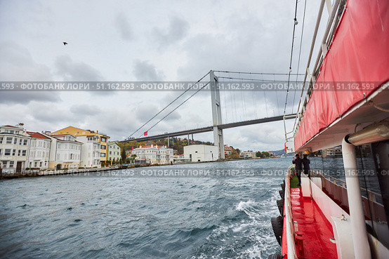 ISTANBUL, TURKEY - NOVEMBER 23, 2021: The Bosphorus Strait. View from a pleasure ship. Редакционное фото, фотограф Наталия Кирсанова / Фотобанк Лори