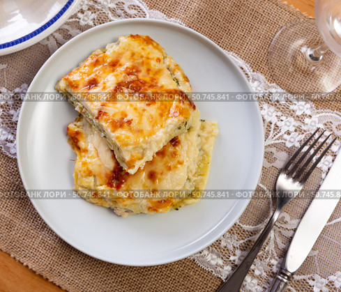 Italian casserole made from filo dough, lightly salted salmon and broccoli cabbage. Стоковое фото, фотограф Яков Филимонов / Фотобанк Лори