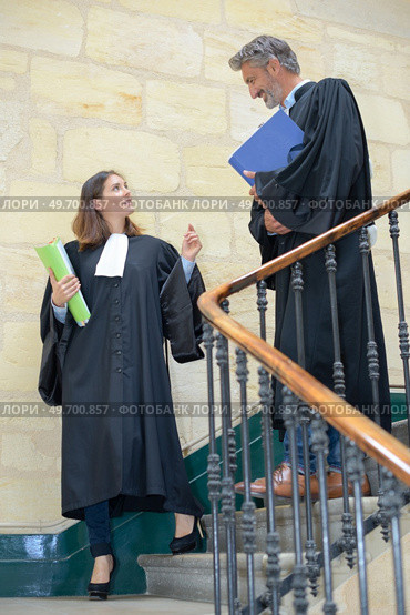 judges meeting on the stairwell. Стоковое фото, агентство Ingram Publishing / Фотобанк Лори
