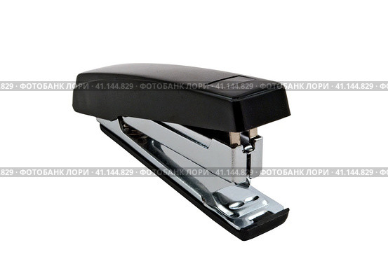 Канцелярский степлер на белом фоне. Stapler isolated on a white background. Стоковое фото, фотограф Татьяна Д / Фотобанк Лори