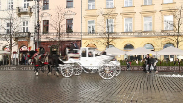 Катание в каретах по улицам Кракова (2015 год). Редакционное видео, видеограф Наталья Волкова / Фотобанк Лори