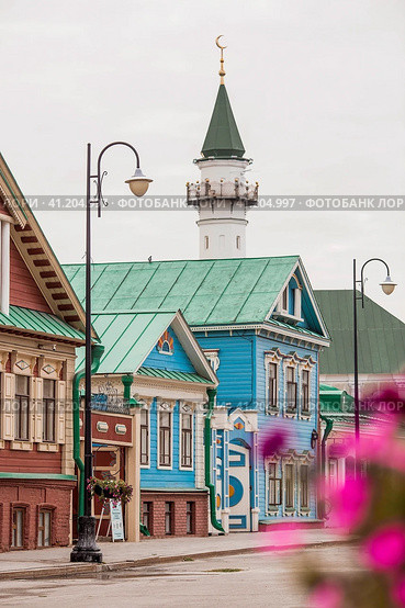 Kayuma Nasyri Street. Staro-Tatarskaya Sloboda. Al-Marjani Mosque. Summer day. Russia, September 2023. The Republic of Tatarstan. Kazan. Редакционное фото, фотограф Photojuli / Фотобанк Лори