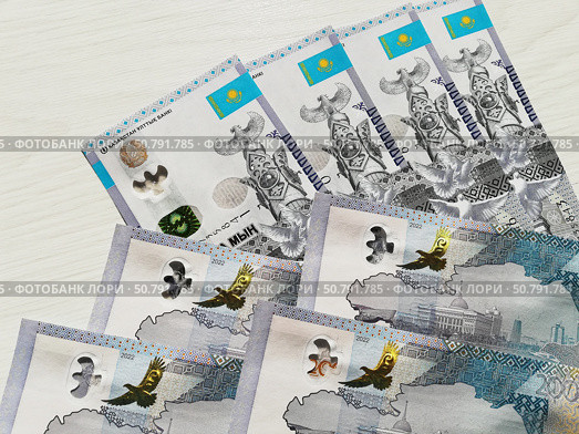 Казахский тенге: купюры номиналом 20000 тенге. Иностранная валюта. Стоковое фото, фотограф Ольга Дерябина / Фотобанк Лори
