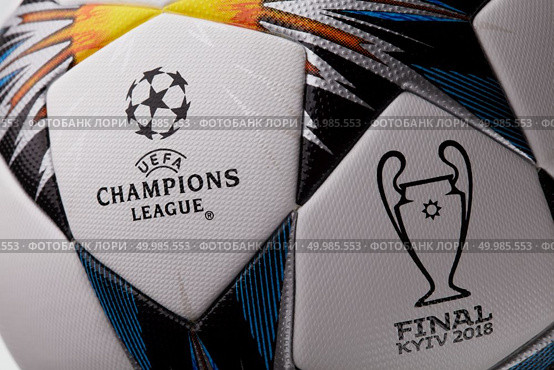 Kiev, Ukraine - February 22, 2018 Official Ball for Champions League Final Soccer , on the ball is the trophy of the Champions League and the inscription in English "Final" and "Kiev 2018". The final of the Champions League 2017-2018 will be held in Kiev on May 26. Close up. Kiev, Ukraine - February 22, 2018: Official ball from adidas for the final match Champions League. Редакционное фото, агентство Ingram Publishing / Фотобанк Лори