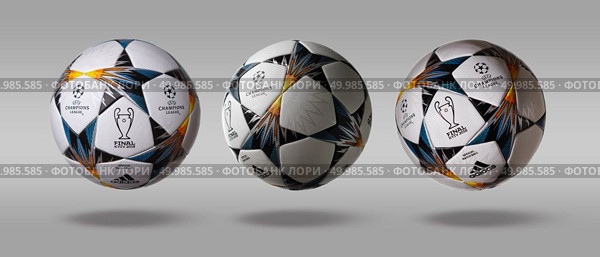 Kiev, Ukraine - February 22, 2018: Three turns the side Adidas official ball on which the stars are painted in blue and yellow colors, symbolizing the Ukrainian flag. Final of the Champions League-2018, which will be held in Kiev. Kiev, Ukraine - February 22, 2018: Three turn the side Adidas official UEFA Champions League ball on a gray background. Редакционное фото, агентство Ingram Publishing / Фотобанк Лори