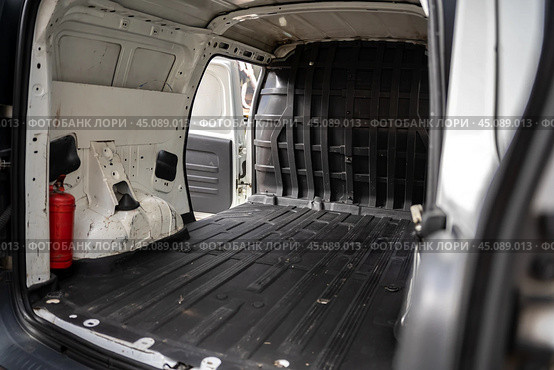 KRASNOYARSK, RUSSIA - September 10, 2024: White Lada Largus. Редакционное фото, фотограф Плотников Дмитрий / Фотобанк Лори