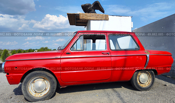 Красный автомобиль "Запорожец" (ЗАЗ-968) Редакционное фото, фотограф Ирина / Фотобанк Лори