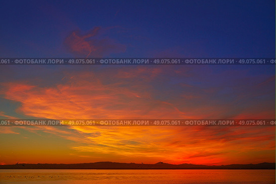 La Albufera lake sunset in El Saler of Valencia at Spain. Стоковое фото, агентство Ingram Publishing / Фотобанк Лори