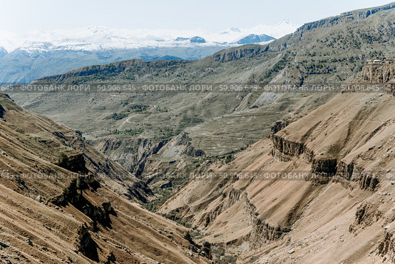 Landscape of Dagestan mountains, mountain range in haze summer Russia. Стоковое фото, фотограф Spirit River / Фотобанк Лори