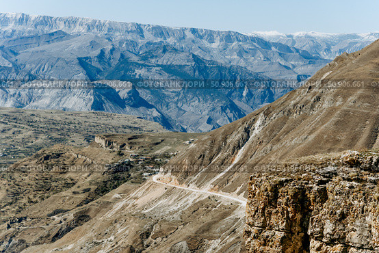 Landscape of Dagestan mountains, mountain range in haze summer Russia. Стоковое фото, фотограф Spirit River / Фотобанк Лори