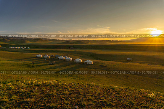 Landscape with yurts and mountains at sunset. Стоковое фото, фотограф Михаил Коханчиков / Фотобанк Лори