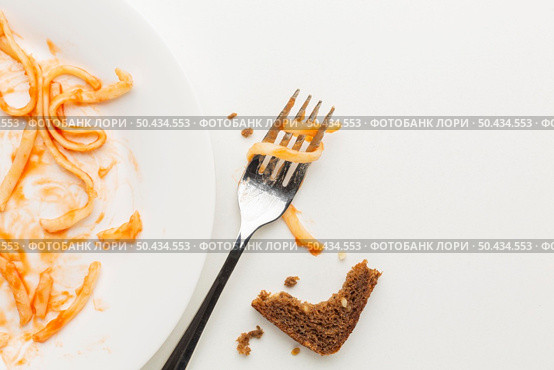 leftover wasted spaghetti pasta fork. Стоковое фото, агентство Ingram Publishing / Фотобанк Лори