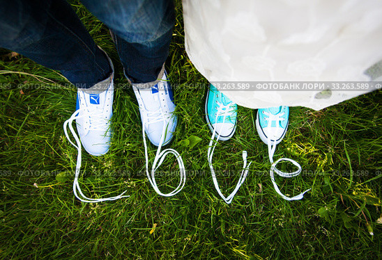 Legs bridal, phrase love. Стоковое фото, фотограф Sergiy Artsaba / Smarterpix / Фотобанк Лори