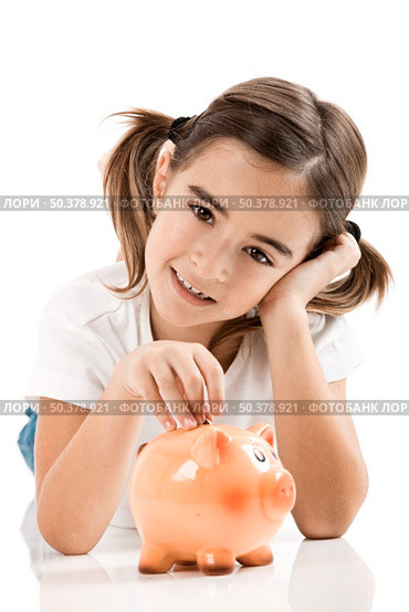 Little girl lying on floor and inserting a one euro coin on the piggy-bank. Стоковое фото, агентство Ingram Publishing / Фотобанк Лори