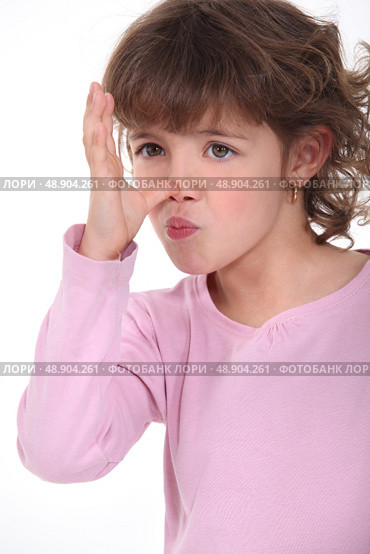 Little girl making a grimace. Стоковое фото, агентство Ingram Publishing / Фотобанк Лори