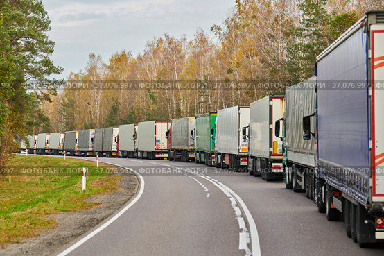 Lorry truck stack in long traffic jam. Стоковое фото, фотограф Дмитрий Калиновский / Фотобанк Лори