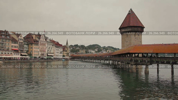 Lucerne, Switzerland. Chapel in Lucerne. Bridge. Reuss River. (2017 год). Стоковое видео, видеограф Александр Артеев / Фотобанк Лори