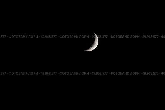 Луна в фазе первой четверти на фоне черного неба. Вид с северного полушария Земли. Стоковое фото, фотограф Алексей Винников / Фотобанк Лори