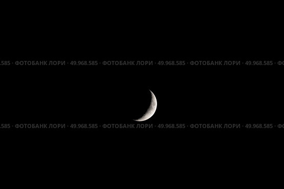 Луна в фазе первой четверти на фоне черного неба. Вид с северного полушария Земли. Стоковое фото, фотограф Алексей Винников / Фотобанк Лори