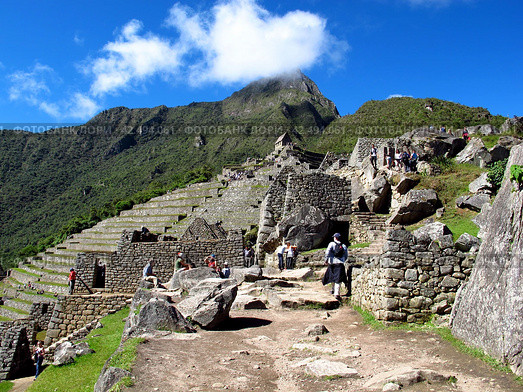 Machu Picchu, Peru - 04 May 2011: Machu Picchu is capital of the Inca Empire in the Andes mountains, Peru, South America. Редакционное фото, фотограф Сергей Стрелков / Фотобанк Лори