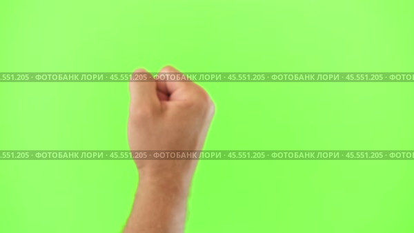Male Hand Knocking Isolated on Chroma Key Green Screen Background. Body Language. 4K Video Footage. Close-Up. Man's Fist Making Knock Knock Gesture. Copy Space for Promotion. Greenscreen for Keying. Стоковое видео, видеограф Марина Демидюк / Фотобанк Лори