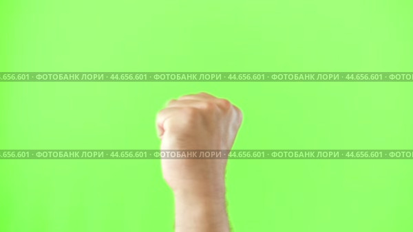 Male Hand Making Rise Up Sign Symbol. Chroma Key Green Screen Background. Gesture Movement. Body Language. 4K Footage. Close Up. Raised Hand. Clenched Closed Fist. Raised Up. Human Equal Rights. Vote. Стоковое видео, видеограф Марина Демидюк / Фотобанк Лори