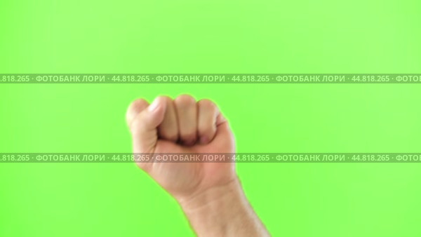 Male Hand Making Rise Up Sign Symbol. Chroma Key Green Screen Background. Gesture Movement. Body Language. 4K Footage. Close Up. Raised Hand. Clenched Closed Fist. Raised Up. Human Equal Rights. Vote. Стоковое видео, видеограф Марина Демидюк / Фотобанк Лори