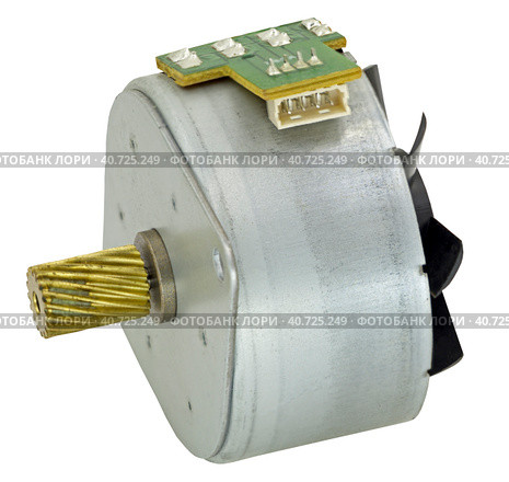 Маленький электрический мотор на белом фоне. Small electric motor on white background. Стоковое фото, фотограф Татьяна Д / Фотобанк Лори