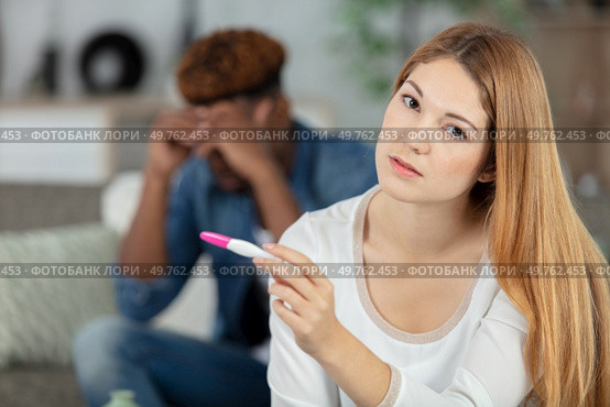 man husband upset about pregnancy test results. Стоковое фото, агентство Ingram Publishing / Фотобанк Лори