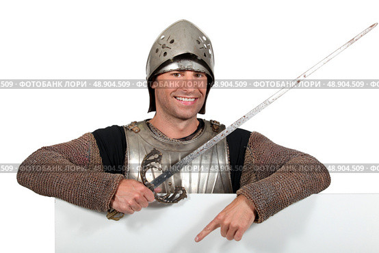 Man in knights costume. Стоковое фото, агентство Ingram Publishing / Фотобанк Лори