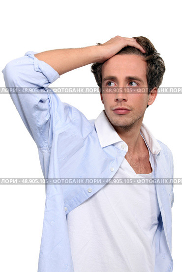 Man running hand through hair. Стоковое фото, агентство Ingram Publishing / Фотобанк Лори