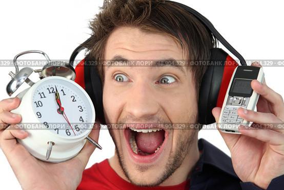 Man shutting out noise. Стоковое фото, агентство Ingram Publishing / Фотобанк Лори