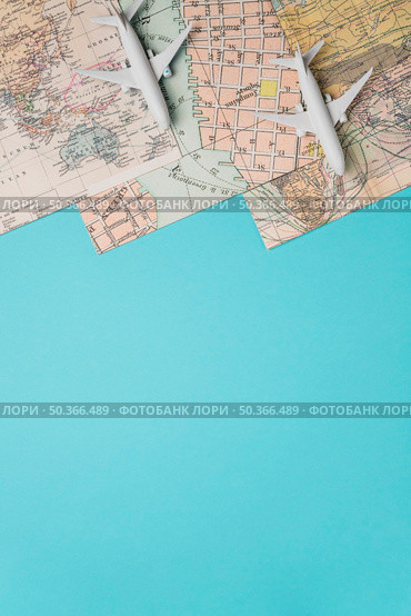 maps toy planes blue background. Стоковое фото, агентство Ingram Publishing / Фотобанк Лори