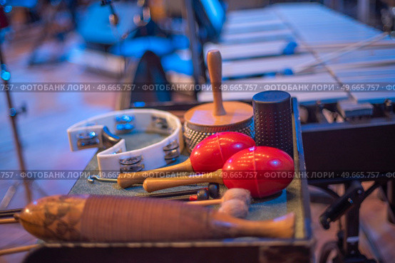 maracas and other musical instruments on stage at the Philharmonic. Стоковое фото, агентство Ingram Publishing / Фотобанк Лори