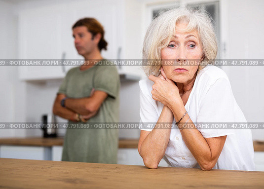 Mature wife dont speaking after discord with husband behind. Стоковое фото, фотограф Яков Филимонов / Фотобанк Лори
