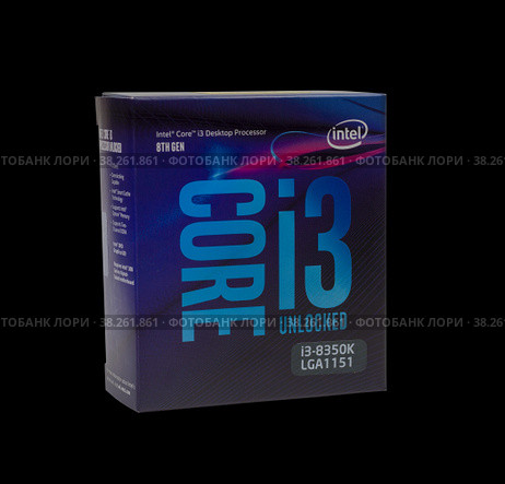 Maykop, Russia - November 12, 2018: intel core I3 desktop processor 8th gen in box isolated on black background. Редакционное фото, фотограф Андрей С / Фотобанк Лори