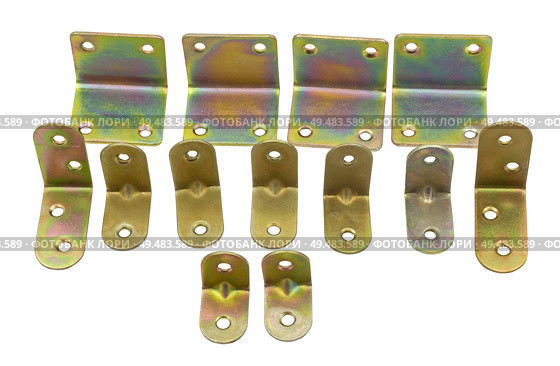 Металлические крепежные угольники на белом фоне. Metallic angle fixators on white background. Стоковое фото, фотограф Татьяна Д / Фотобанк Лори