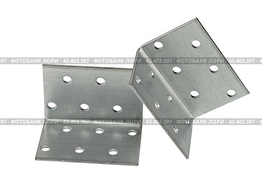 Металлический крепежный угольник на белом фоне. Metallic angle fixator on white background. Стоковое фото, фотограф Татьяна Д / Фотобанк Лори
