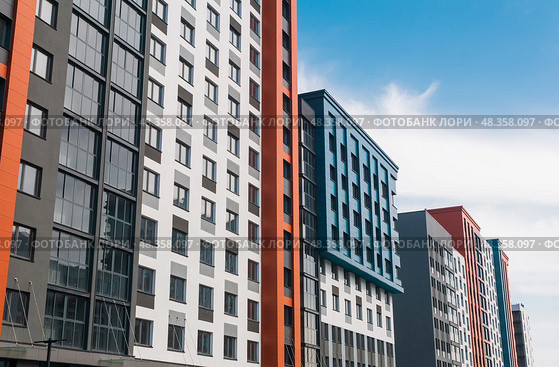 Modern apartment buildings in the city. Multicolored facades of modern buildings. Стоковое фото, фотограф Евгений Харитонов / Фотобанк Лори