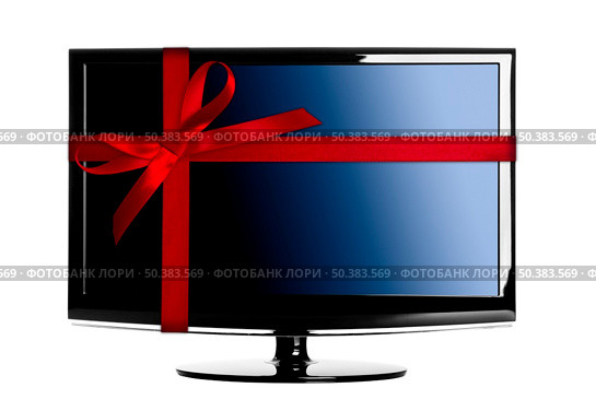 Modern Led tv with a red Christmas ribbon. Стоковое фото, агентство Ingram Publishing / Фотобанк Лори