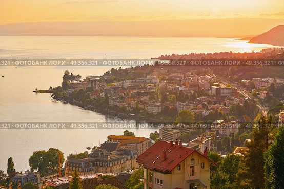 Montreux sunset skyline in Leman Geneva Swiss. Montreux sunset skyline in Leman Geneva lake Switzerland Swiss. Стоковое фото, агентство Ingram Publishing / Фотобанк Лори